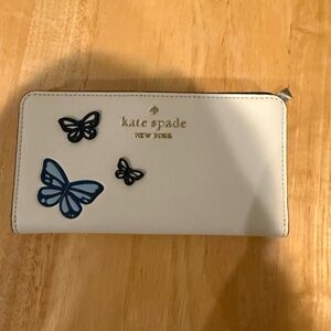 Kate Spade Cream Wallet with Blue Butterfly Accents